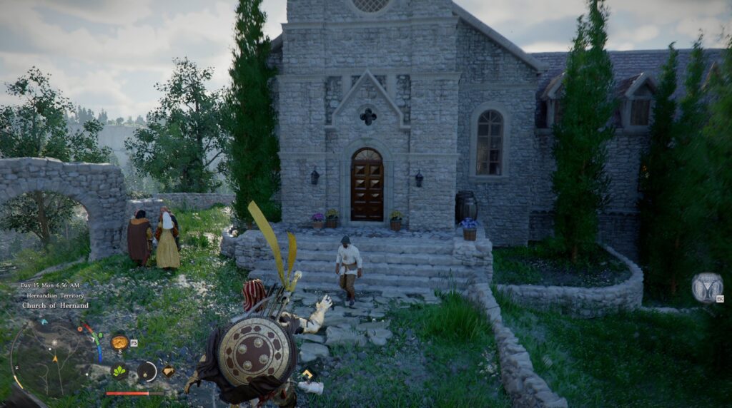 Персонаж Assassin’s Creed Valhalla идет к каменной церкви