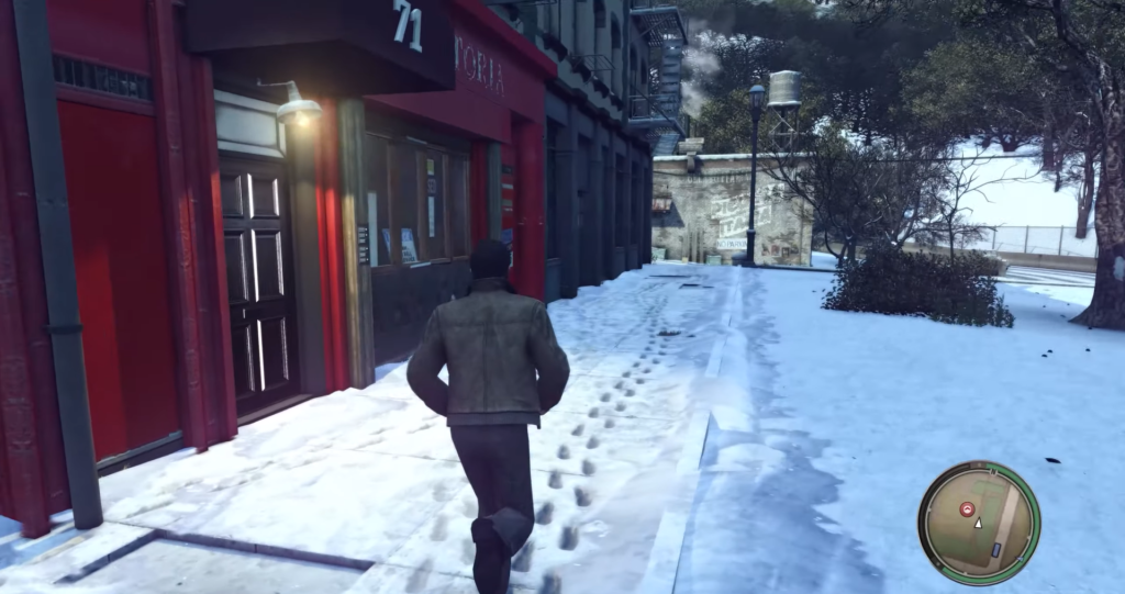 Вито Скалетта бежит по заснеженной улице Mafia II
