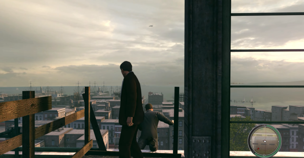 Томми Анджело стоит на стройке над городом Mafia II