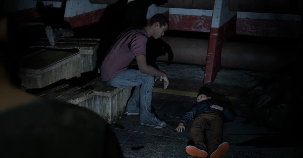 Маркус из Detroit: Become Human сидит рядом с мальчиком на полу