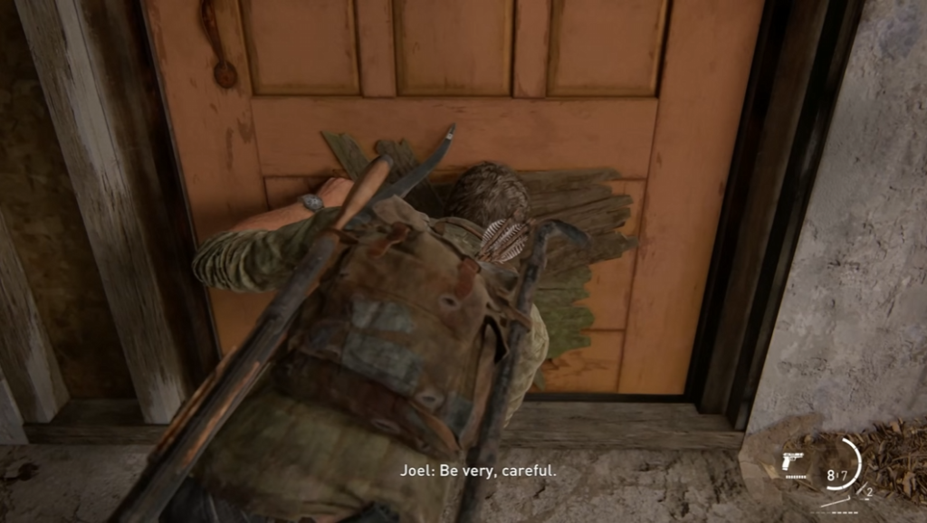Джоэл из The Last of Us открывает дверь