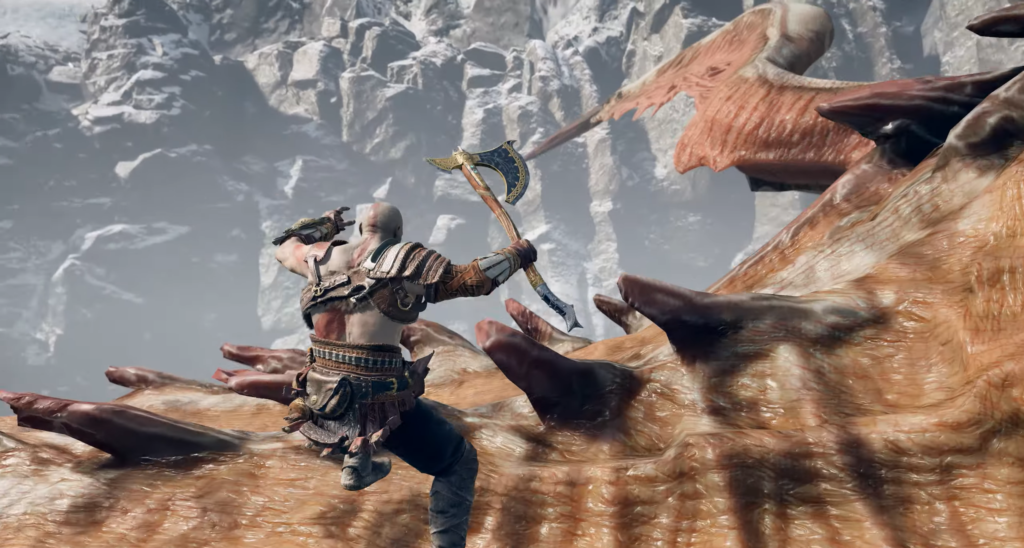 Warrior holding spear on rocky desert plateau