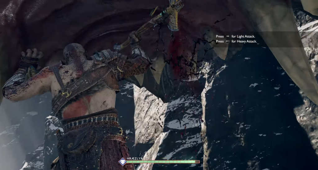 Warrior holding sword on grassy cliff overlooking valley