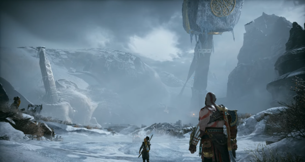 Кратос и Атрей идут по снежной долине God of War