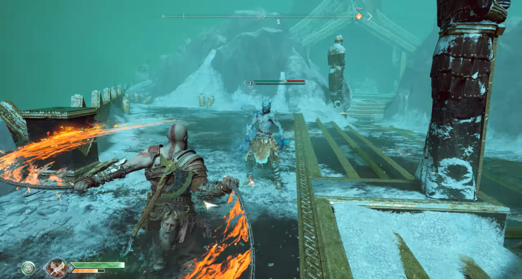 Кратос с огненными клинками сражается на снегу в God of War