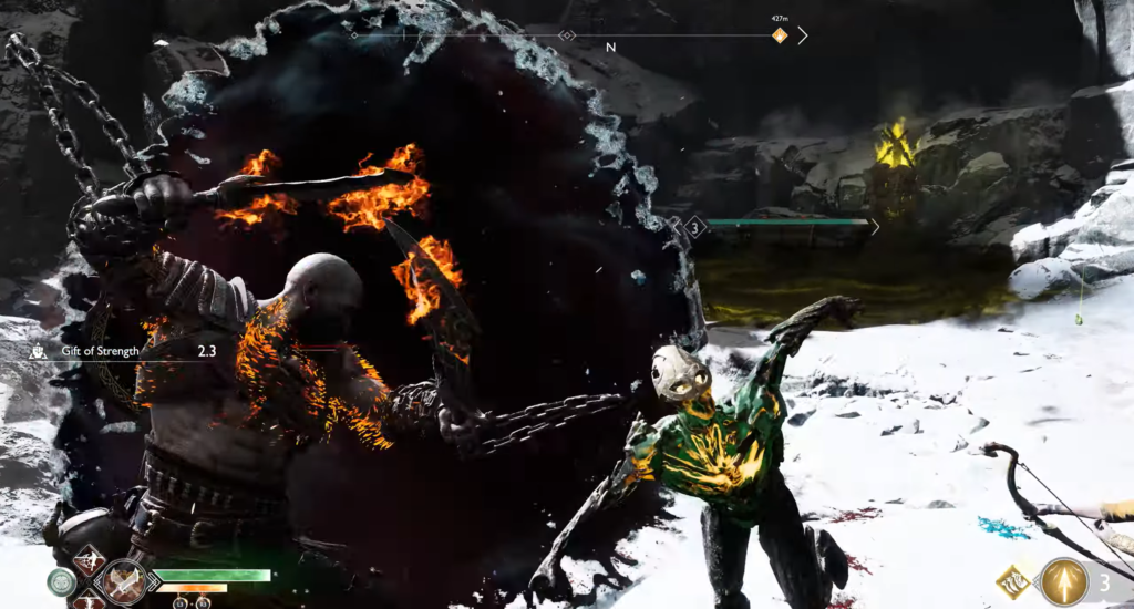 Кратос атакует врага цепями в снегу God of War