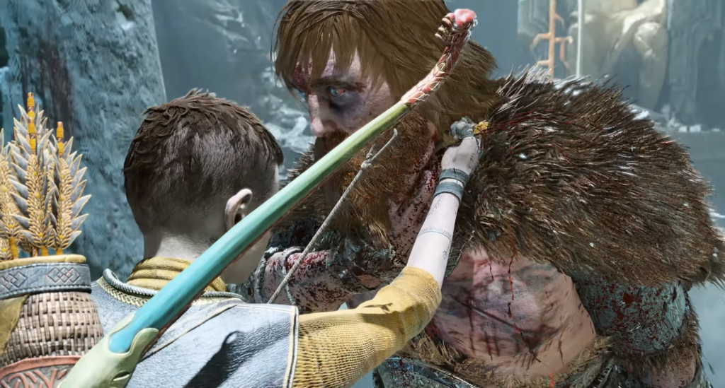 Атрей обнимает раненого Тора в God of War Ragnarok