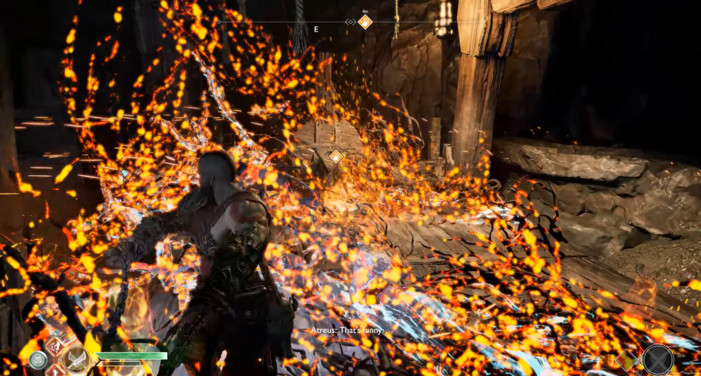 Кратос сражается в огненных искрах в пещере God of War