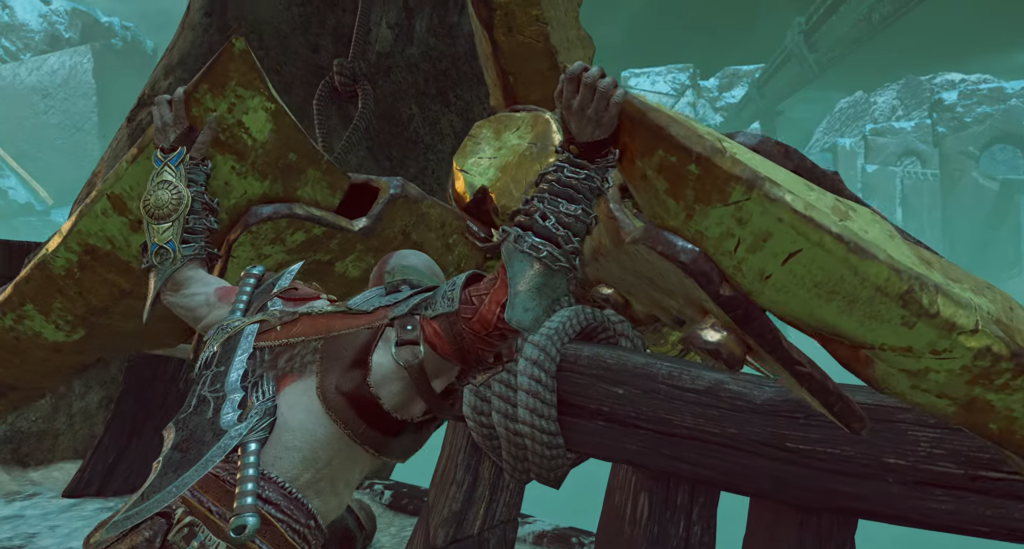 Кратос из God of War поднимает зелёный механизм на мосту