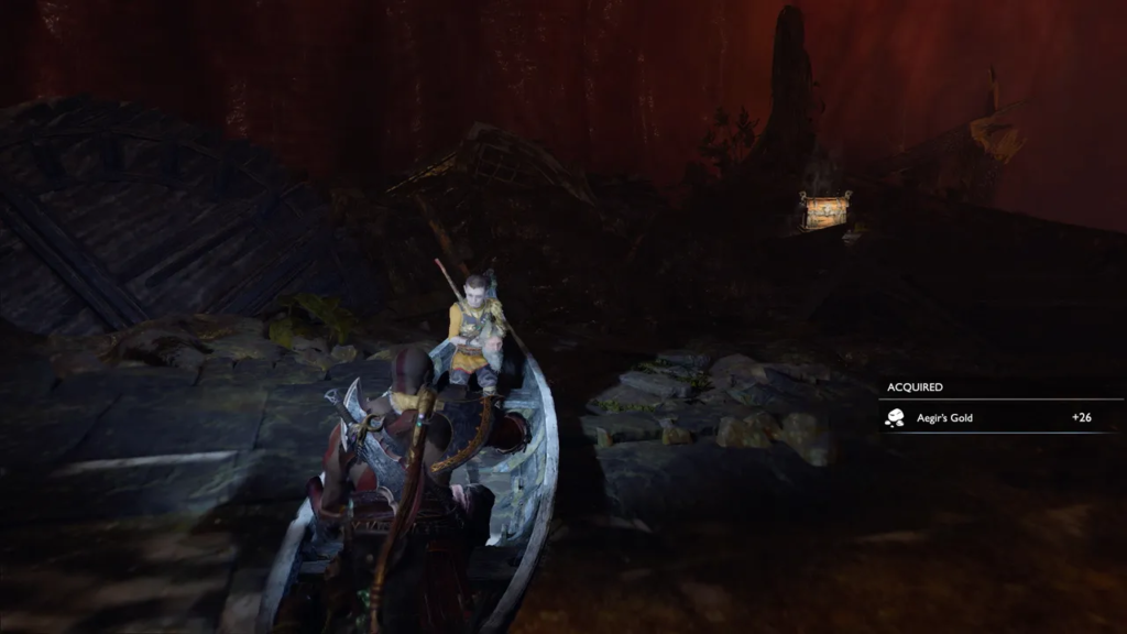 Кратос и Атрей в лодке у скал God of War