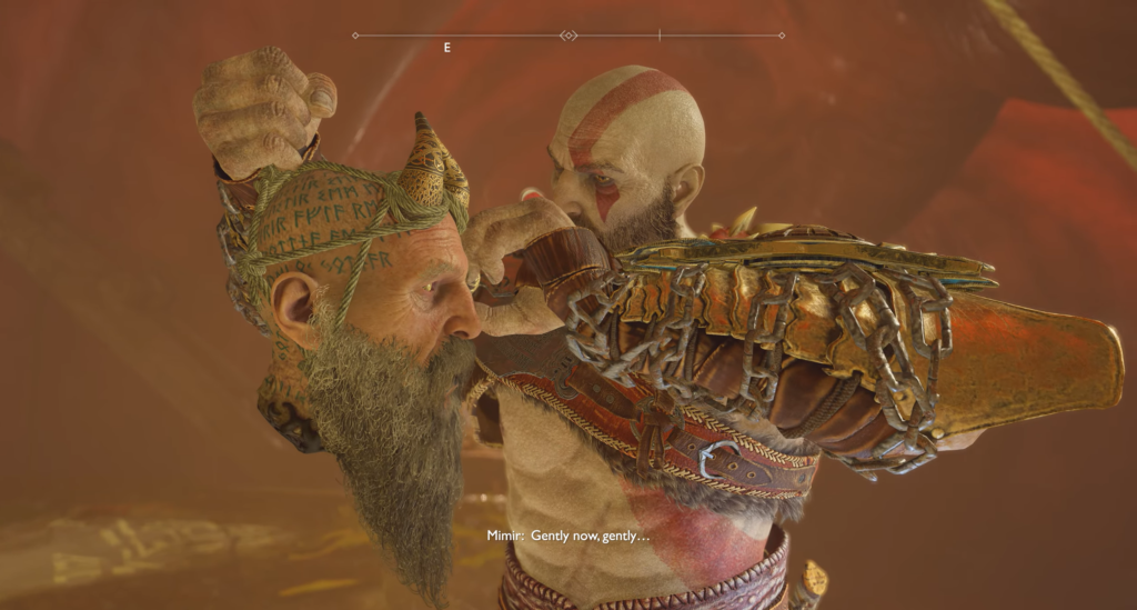 Кратос держит голову Мимира в God of War