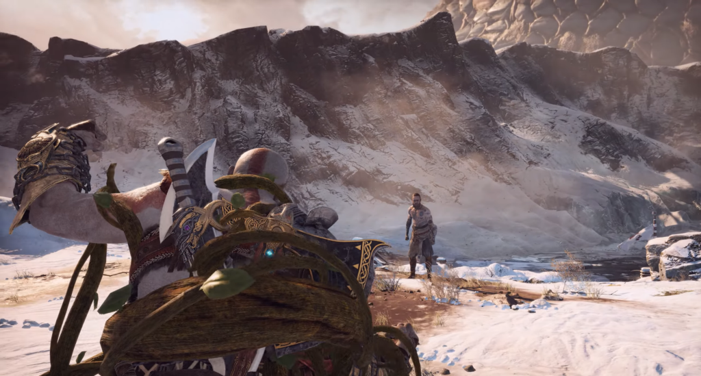 Кратос из God of War целится топором в снегу
