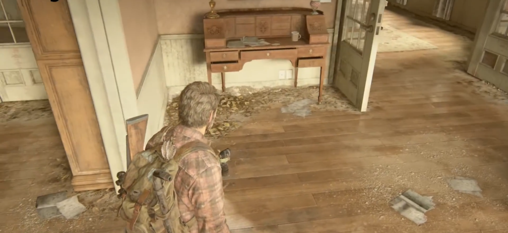 Джоэл из The Last of Us осматривает комнату дома