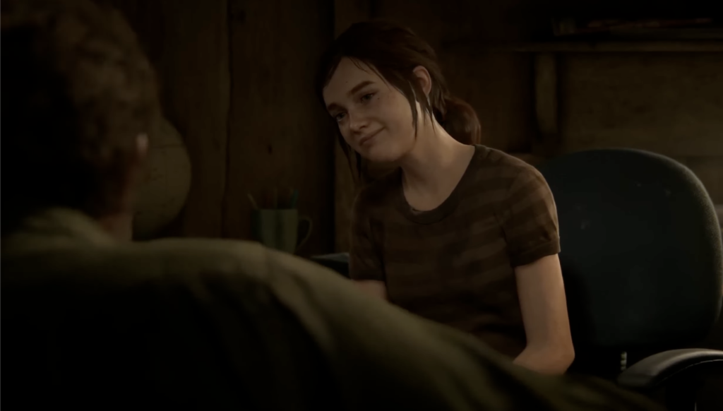 Элли из The Last of Us улыбается в комнате