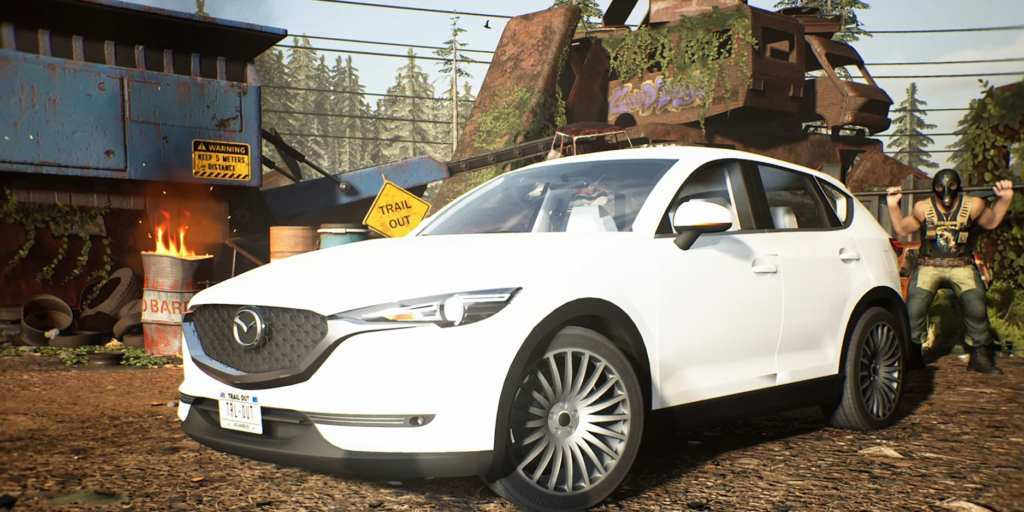 Белый кроссовер Mazda стоит на свалке металлолома