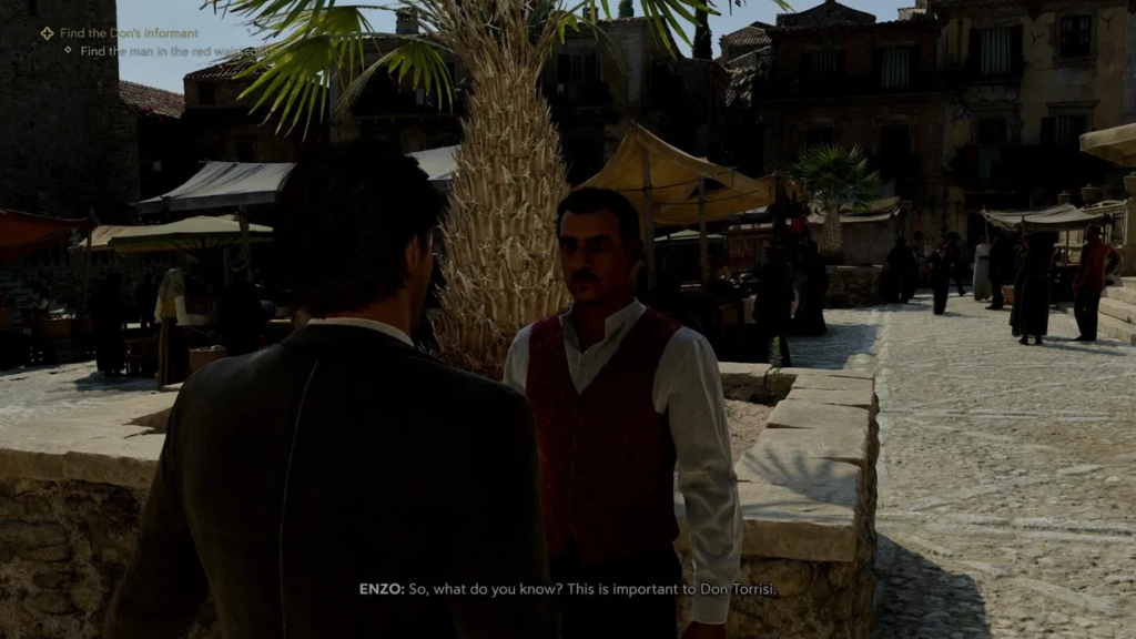 Энцо разговаривает с мужчиной на рыночной площади Mafia II