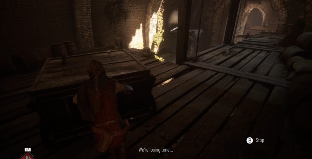 Амиция толкает ящик в кирпичном помещении A Plague Tale