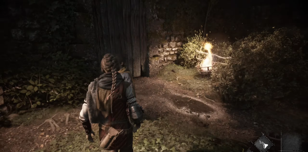 Амиция идет по двору к костру A Plague Tale