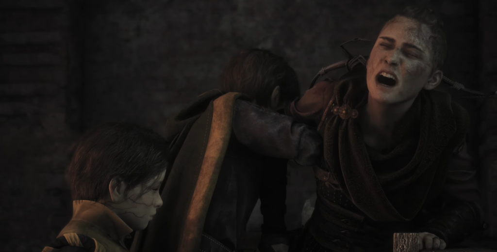 Амиция обнимает Хьюго в темной комнате, A Plague Tale