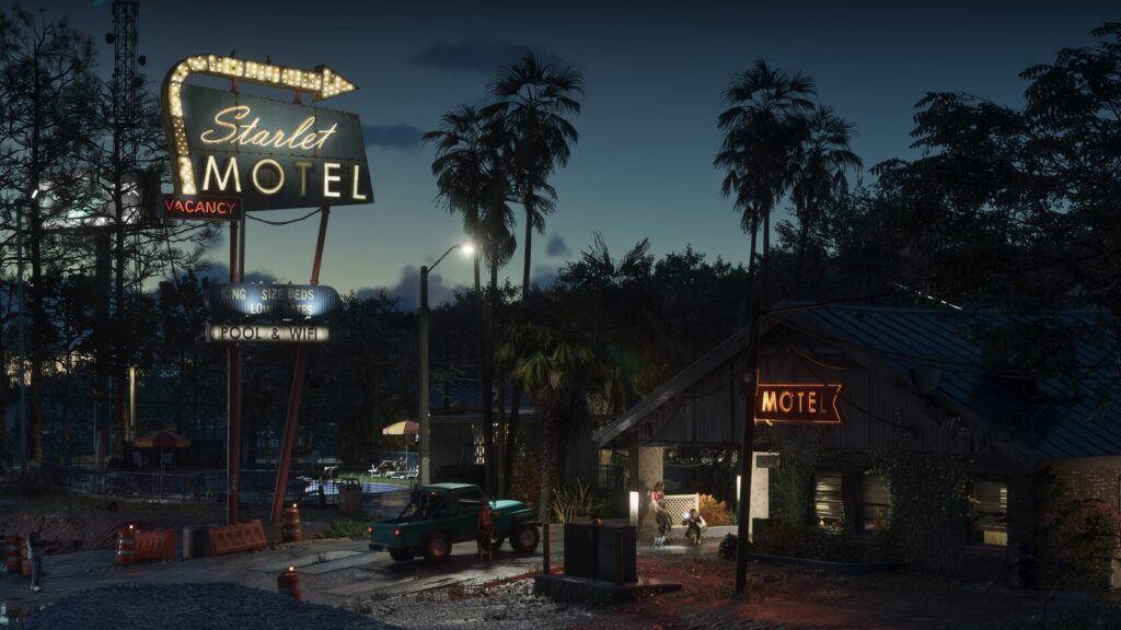Неоновая вывеска Starlet Motel светится ночью у мотеля